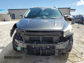 2017 Ford Escape Titanium with VIN 1FMCU0J95HUF02694, listed as a Copart auction lot 49861745 with 114,602 mi miles and Salvage Title. Bid and sale history available at DreamBid. Image 5.