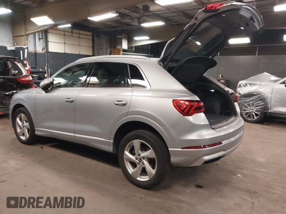 2021 Audi Q3 Premium with VIN WA1AUCF34M1078805, listed as a IAAI auction lot 42026360 with 38,473 mi miles and . Bid and sale history available at DreamBid. Image 3.