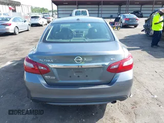 2018 Nissan Altima 2.5 SR with VIN 1N4AL3AP3JC127999, listed as a IAAI auction lot 42016201 with 120,628 mi miles. Bid and sale history available at carsss.com. Image 16.