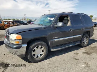 2004 GMC Yukon SLT with VIN 1GKEC13T54R296969, listed as a Copart auction lot 52738825 with 185,049 mi miles and Salvage Title. Bid and sale history available at carsss.com. Image 1.