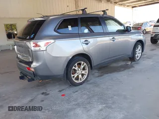 2014 Mitsubishi Outlander SE z VIN JA4AD3A32EZ011176, wystawiony jako IAAI lot #42336692 z przebiegiem 145 492 mil mil oraz . Historia ofert i sprzedaży dostępna na DreamBid. Obrazek 4.