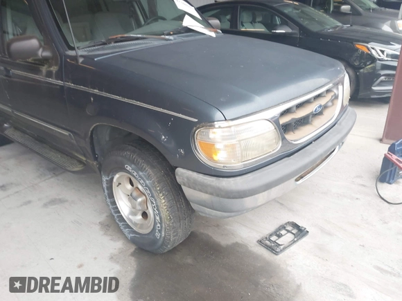 1998 Ford Explorer XL z VIN 1FMZU34X8WUC69252, wystawiony jako IAAI lot #42308913 z przebiegiem 140 858 mil mil oraz . Historia ofert i sprzedaży dostępna na DreamBid. Obrazek 6.
