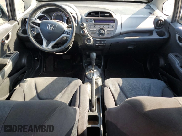 2010 Honda Fit Sport with VIN JHMGE8H47AS023964, listed as a Copart auction lot 61797995 with 78,518 mi miles and Salvage title. Bid and sale history available at DreamBid. Image 8.