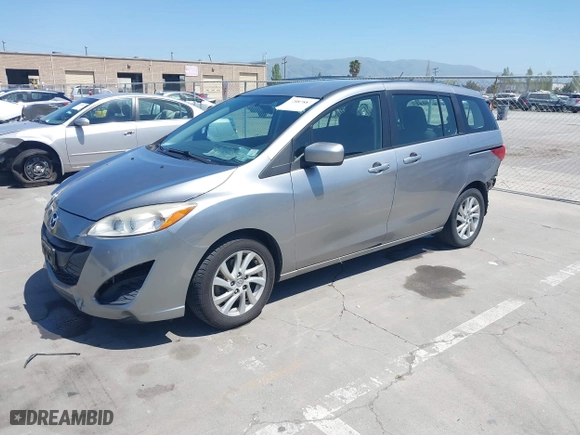 2012 Mazda Mazda5 Sport with VIN JM1CW2BL4C0103408, listed as a IAAI auction lot 42087883 with 219,601 mi miles. Bid and sale history available at carsss.com. Image 18.