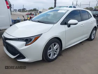 2020 Toyota Corolla Hatchback SE with VIN JTND4RBE3L3077866, listed as a IAAI auction lot 42078596 with 60,153 mi miles. Bid and sale history available at carsss.com. Image 2.