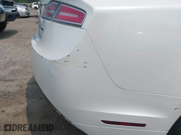 2015 Lincoln MKZ z VIN 3LN6L2G96FR625086, wystawiony jako IAAI lot #42406467 z przebiegiem 24 130 mil mil oraz . Historia ofert i sprzedaży dostępna na DreamBid. Obrazek 15.