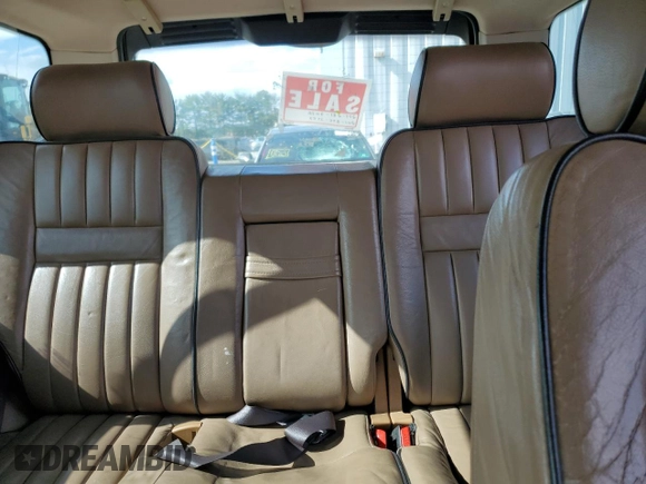 2001 Land Rover Range Rover z VIN SALPM16461A455877, wystawiony jako Copart lot #73062514 z przebiegiem Nie podano mil oraz Czysty tytuł • Clean title. Historia ofert i sprzedaży dostępna na DreamBid. Obrazek 10.