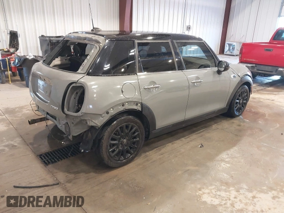 2015 MINI Hardtop 4 Door with VIN WMWXS5C58FT830081, listed as a IAAI auction lot 41345037 with 93,545 mi miles and . Bid and sale history available at DreamBid. Image 4.