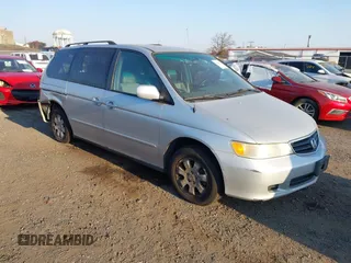 2004 Honda Odyssey EX-L with VIN 5FNRL18964B025323, listed as a IAAI auction lot 40714457 with 164,786 mi miles and . Bid and sale history available at DreamBid. Image 1.