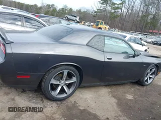 2014 Dodge Challenger R/T z VIN 2C3CDYBT7EH293104, wystawiony jako IAAI lot #41452435 z przebiegiem 49 728 mil mil oraz . Historia ofert i sprzedaży dostępna na DreamBid. Obrazek 13.