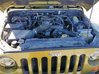 2007 Jeep Wrangler Unlimited Sahara z VIN 1J4GB591X7L165493, wystawiony jako Copart lot #47468205 z przebiegiem Nie podano mil oraz Czysty tytuł • Clean title. Historia ofert i sprzedaży dostępna na DreamBid. Obrazek 11.
