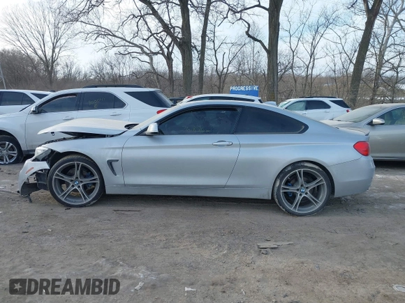 2015 BMW 4 Series 428i xDrive with VIN WBA3N9C53FK247985, listed as a IAAI auction lot 41395534 with 76,856 mi miles and . Bid and sale history available at DreamBid. Image 14.