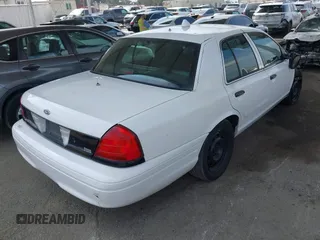 2009 Ford Police Interceptor with VIN 2FAHP71V29X129265, listed as a IAAI auction lot 42381382 with Not provided miles and . Bid and sale history available at DreamBid. Image 4.