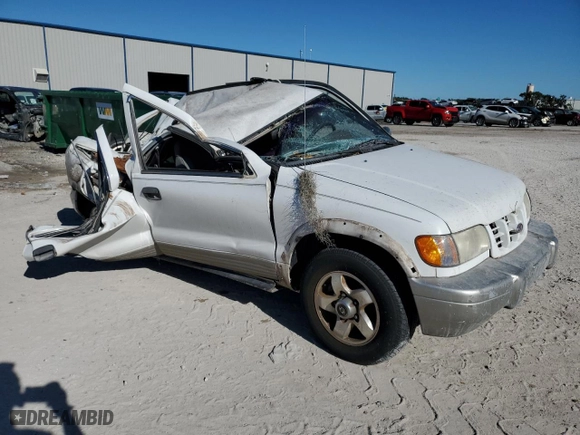 1998 Kia Sportage with VIN KNDJB7232W5569054, listed as a Copart auction lot 82756824 with 106,550 mi miles and Salvage Title. Bid and sale history available at carsss.com. Image 4.