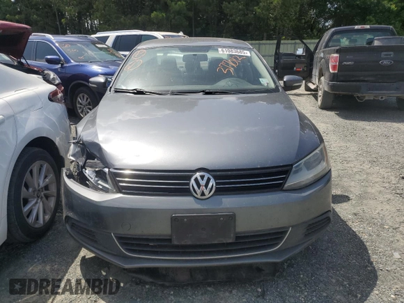 2013 Volkswagen Jetta SE z VIN 3VWDP7AJ8DM377012, wystawiony jako Copart lot #61083685 z przebiegiem 180 787 mil mil oraz Szkoda całkowita • Salvage title. Historia ofert i sprzedaży dostępna na DreamBid. Obrazek 5.
