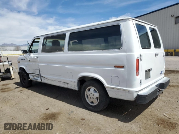 1989 Ford Econoline Cargo with VIN 1FTEE14Y2KHC41026, listed as a Copart auction lot 49440055 with 54,481 mi miles and Salvage Title. Bid and sale history available at DreamBid. Image 2.