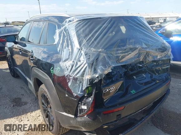 2025 Mazda CX-50 S Preferred z VIN 7MMVABBMXSN337974, wystawiony jako IAAI lot #42238129 z przebiegiem 6 159 mil mil oraz . Historia ofert i sprzedaży dostępna na DreamBid. Obrazek 3.