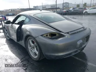 2012 Porsche 718 Cayman z VIN WP0AA2A88CS760106, wystawiony jako IAAI lot #41921806 z przebiegiem 120 501 mil mil oraz . Historia ofert i sprzedaży dostępna na DreamBid. Obrazek 3.