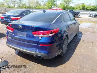 2020 Kia Optima LX with VIN 5XXGT4L38LG407103, listed as a IAAI auction lot 42130742 with 76,841 mi miles and . Bid and sale history available at DreamBid. Image 4.