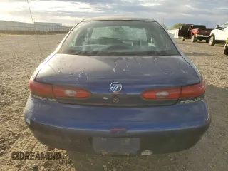 1996 Mercury Sable GS z VIN 1MELM50U3TA659219, wystawiony jako Copart lot #74373944 z przebiegiem 156 398 mil mil oraz Szkody całkowita. Historia ofert i sprzedaży dostępna na DreamBid. Obrazek 6.