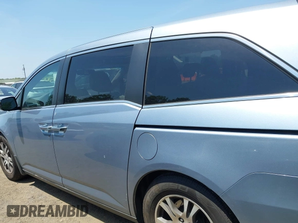 2011 Honda Odyssey EX-L with VIN 5FNRL5H60BB051135, listed as a IAAI auction lot 42588994 with 195,112 mi miles and . Bid and sale history available at DreamBid. Image 14.