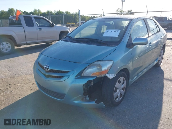 2007 Toyota Yaris with VIN JTDBT923371029654, listed as a IAAI auction lot 42142361 with 296,107 mi miles. Bid and sale history available at carsss.com. Image 6.