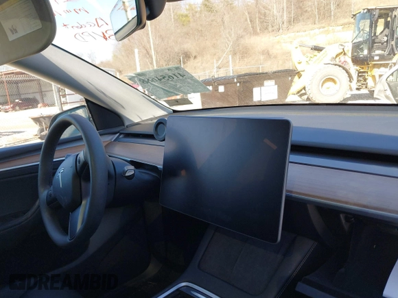 2023 Tesla Model Y Long Range with VIN 7SAYGAEE7PF971620, listed as a IAAI auction lot 41654688 with Not Provided miles and . Bid and sale history available at DreamBid. Image 16.