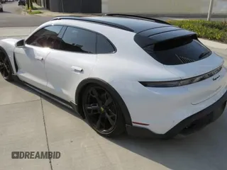 2022 Porsche Taycan 4 z VIN WP0BA2Y19NSA67581, wystawiony jako Copart lot #59634035 z przebiegiem 6 775 mil mil oraz Szkoda całkowita • Salvage title. Historia ofert i sprzedaży dostępna na DreamBid. Obrazek 4.
