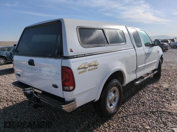 1999 Ford F-150 XL with VIN 1FTRX18L2XKA97143, listed as a Copart auction lot 52973695 with 115,180 mi miles and Salvage Title. Bid and sale history available at carsss.com. Image 3.