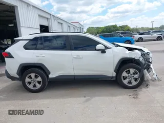 2019 Toyota RAV4 XLE with VIN 2T3W1RFVXKW033696, listed as a IAAI auction lot 42044151 with 126,872 mi miles and . Bid and sale history available at DreamBid. Image 14.