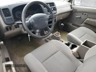 2001 Nissan Frontier XE with VIN 1N6DD26S91C398560, listed as a Copart auction lot 87893925 with 184,831 mi miles and Salvage title. Bid and sale history available at DreamBid. Image 8.