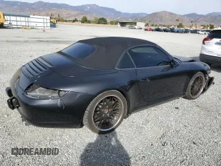 2006 Porsche 911 Carrera S with VIN WP0CB29906S766408, listed as a Copart auction lot 79298064 with 49,449 mi miles and Salvage Title. Bid and sale history available at carsss.com. Image 3.