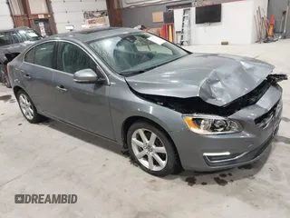 2016 Volvo S60 T5 Premier z VIN YV1612TK0G2410743, wystawiony jako IAAI lot #41717318 z przebiegiem 87 087 mil mil oraz . Historia ofert i sprzedaży dostępna na DreamBid. Obrazek 1.