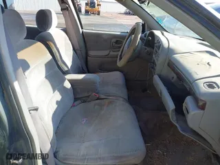 1995 Chevrolet Lumina with VIN 2G1WL52M6S9296674, listed as a IAAI auction lot 41830589 with 105,473 mi miles. Bid and sale history available at carsss.com. Image 4.