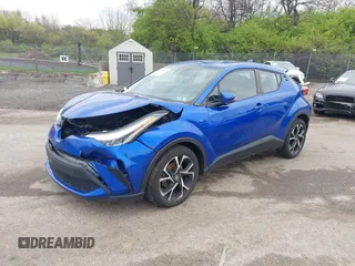 2020 Toyota C-HR LE with VIN NMTKHMBX4LR116336, listed as a IAAI auction lot 42029685 with 77,603 mi miles. Bid and sale history available at carsss.com. Image 2.
