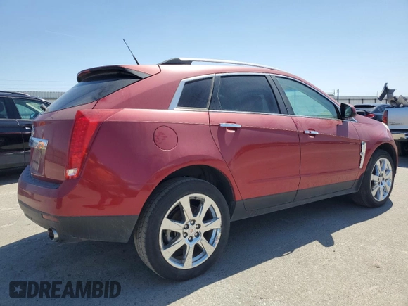2011 Cadillac SRX Premium Collection z VIN 3GYFNCEY5BS586695, wystawiony jako Copart lot #52186835 z przebiegiem 142 210 mil mil oraz Czysty tytuł • Clean title. Historia ofert i sprzedaży dostępna na DreamBid. Obrazek 3.