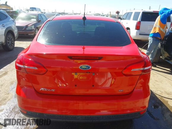 2015 Ford Focus SE z VIN 1FADP3F24FL283927, wystawiony jako IAAI lot #41755250 z przebiegiem Nie podano mil oraz . Historia ofert i sprzedaży dostępna na DreamBid. Obrazek 16.