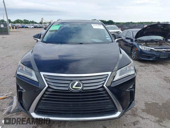 2016 Lexus RX 350 z VIN 2T2BZMCA4GC017342, wystawiony jako IAAI lot #42357093 z przebiegiem 142 515 mil mil oraz . Historia ofert i sprzedaży dostępna na DreamBid. Obrazek 12.