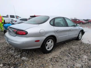 1998 Ford Taurus LX with VIN 1FAFP52U8WG232726, listed as a Copart auction lot 45687605 with 67,793 mi miles and Salvage Title. Bid and sale history available at carsss.com. Image 3.