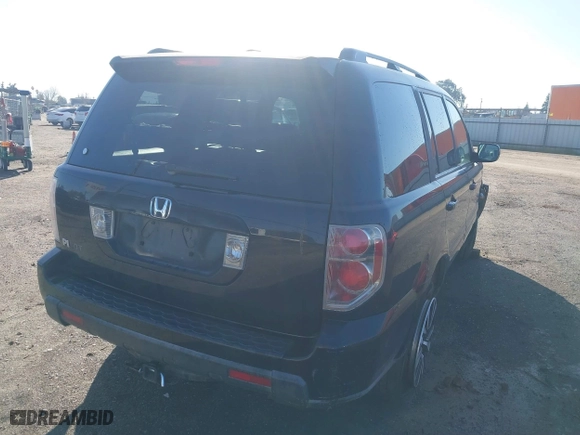 2006 Honda Pilot EX-L with VIN 5FNYF28586B037160, listed as a IAAI auction lot 41798991 with 207,486 mi miles. Bid and sale history available at carsss.com. Image 4.