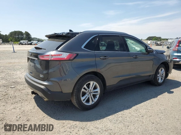 2020 Ford Edge SEL с VIN 2FMPK4J93LBB60742, выставлен на аукционе Copart как лот 52604255 с пробегом 37 659 миль миль и Списание • Salvage title. История ставок и продаж доступна на DreamBid. Изображение 3.