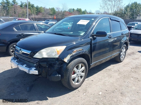 2009 Honda CR-V EX-L with VIN JHLRE48799C012129, listed as a IAAI auction lot 42016110 with 141,819 mi miles. Bid and sale history available at carsss.com. Image 2.