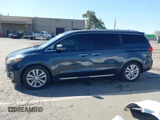 2016 Kia Sedona SX-L with VIN KNDME5C15G6083811, listed as a IAAI auction lot 41932863 with 124,218 mi miles. Bid and sale history available at carsss.com. Image 14.