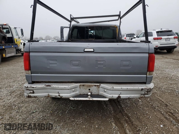 1987 Ford F-150 with VIN 1FTDF15Y6HPA66012, listed as a Copart auction lot 85805244 with 32,344 mi miles and Salvage Title. Bid and sale history available at carsss.com. Image 6.