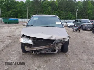2003 Honda Odyssey EX z VIN 2HKRL18683H505577, wystawiony jako IAAI lot #42118231 z przebiegiem 234 329 mil mil oraz . Historia ofert i sprzedaży dostępna na DreamBid. Obrazek 6.
