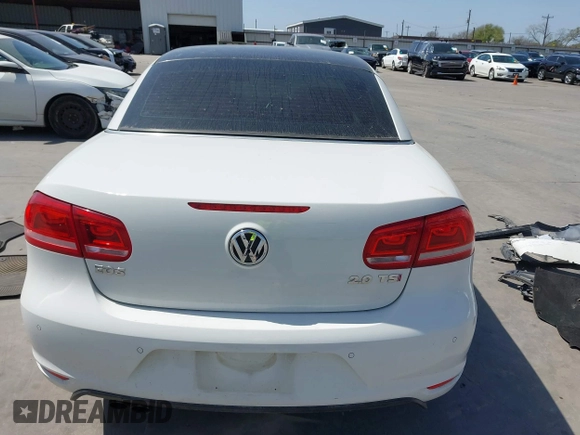 2012 Volkswagen Eos Executive with VIN WVWFW7AH9CV022169, listed as a IAAI auction lot 41795571 with 101,375 mi miles and . Bid and sale history available at DreamBid. Image 16.