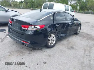 2016 Kia Optima LX with VIN 5XXGT4L31GG024240, listed as a IAAI auction lot 41727309 with 70,031 mi miles. Bid and sale history available at carsss.com. Image 4.