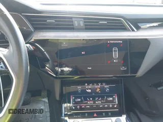 2019 Audi e-tron Prestige with VIN WA1VAAGE2KB021539, listed as a IAAI auction lot 42007353 with 14,238 mi miles and . Bid and sale history available at DreamBid. Image 19.