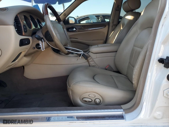 2001 Jaguar XJ VDP with VIN SAJDA24C11LF28715, listed as a Copart auction lot 65246334 with 107,965 mi miles and Salvage Title. Bid and sale history available at carsss.com. Image 7.