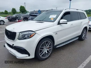 2018 Mercedes-Benz GLS 63 AMG with VIN 4JGDF7FE1JB099084, listed as a IAAI auction lot 42220385 with 97,904 mi miles and . Bid and sale history available at DreamBid. Image 2.